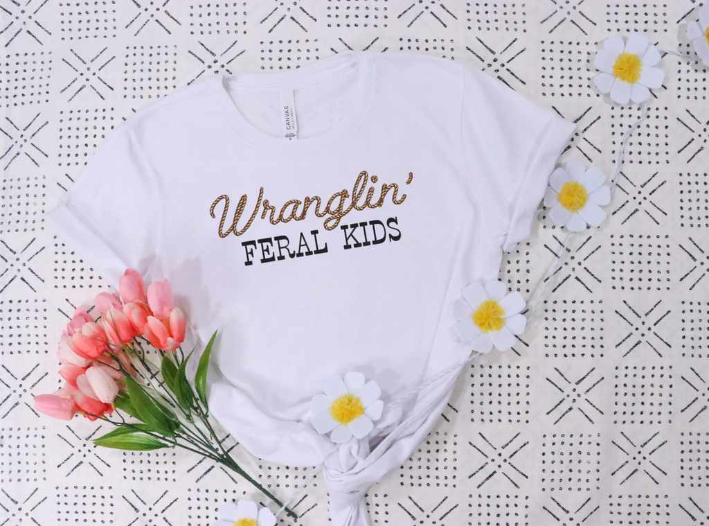 “Wranglin’ Feral Kids” Tee